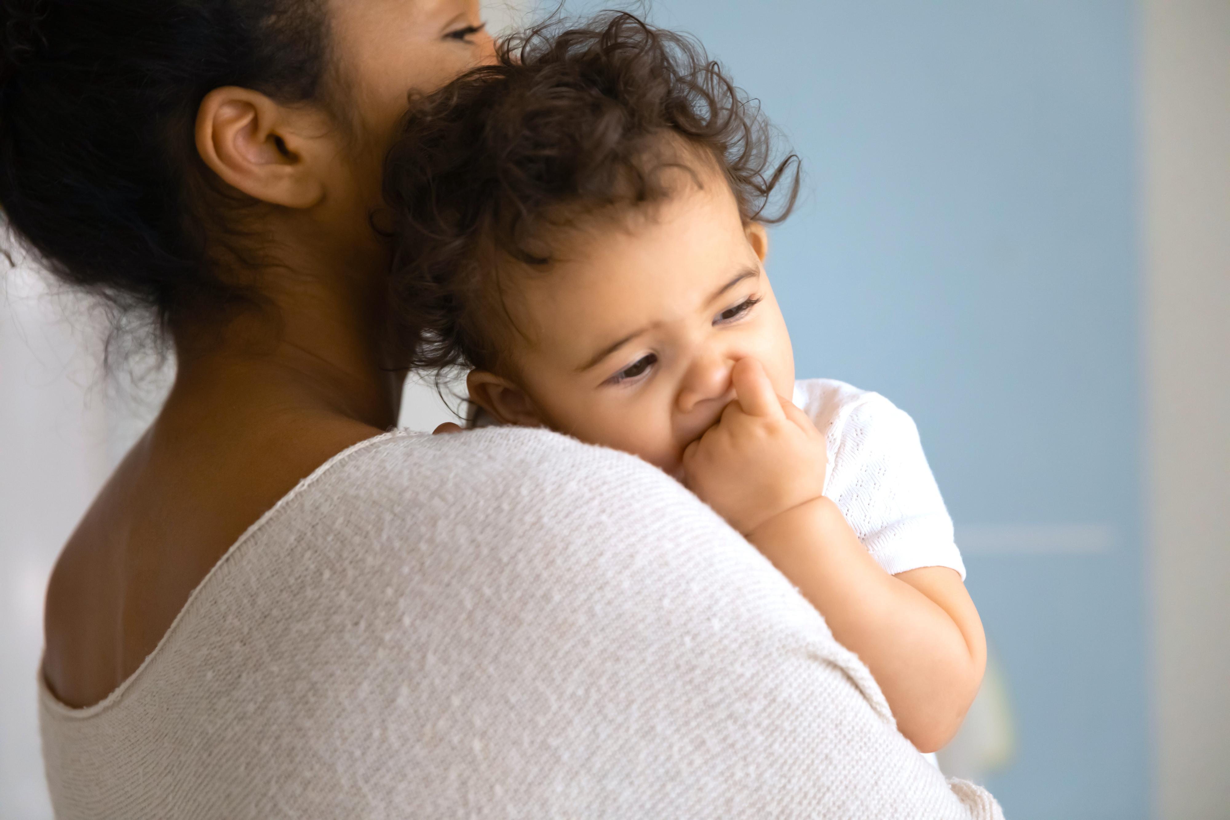 Mother holding child