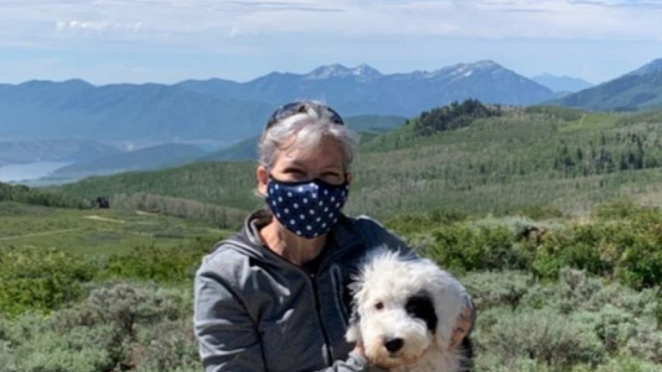 Gracie the therapy dog and Ann Butt 