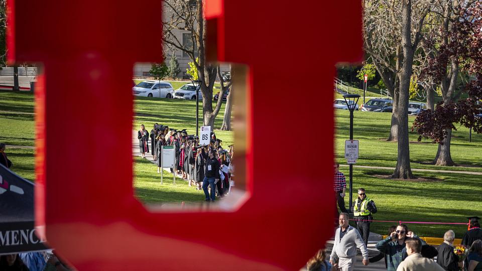 Graduates line up outside kingsbury hall 