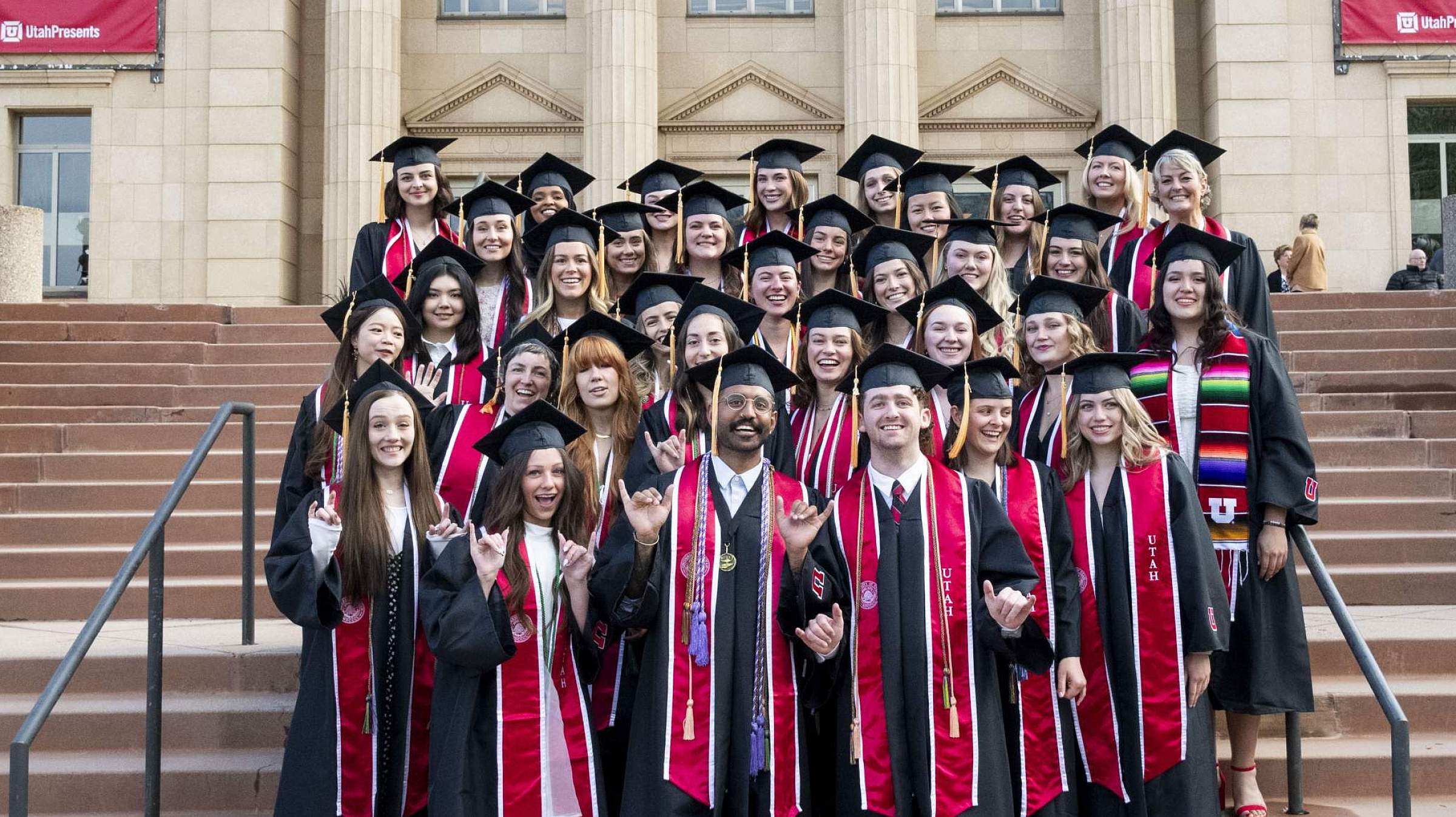 Graduates on the steps of Kingsbury Hall